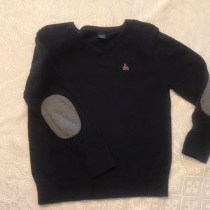 Navy blue sweater with gray patched elbows